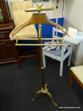 BRASS STANDING SUIT VALET WITH WOODEN HANGER; HAS TRAY ON TOP AT FINISL OVER WOODEN HANGER PORTION,