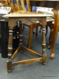 ANTIQUE WALNUT ELGIN SIMONDS TRIANGLE SHAPED ACCENT TABLE; MOLDED 3 CORNERED TOP SURFACE WITH CARVED