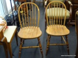 PAIR OF MAPLE WINDSOR CHAIRS; HOOP BACKS WITH SPINDLES ACROSS, MOLDED SEATS, TURNED LEGS AND FOOT
