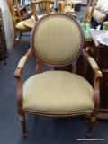 ROUND BACK UPHOLSTERED BACK/SEAT ARMCHAIR; VINTAGE WOODEN ARMCHAIR WITH ROUND GREEN AND TAN FLORAL