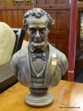ABRAHAM LINCOLN BUST; BRONZE COLORED BUST OF FORMER PRESIDENT ABRAHAM LINCOLN. HAS THE MAKERS STAMP
