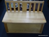 BLONDE WOOD BENCH WITH STORAGE SEAT; SLAT BACK ON A SOLID WOOD BASE WITH HINGED LID. MEASURES 37 IN