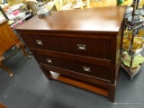 DARK WOOD GRAIN 2 DRAWER DRESSER; HAS 2 DRAWERS WITH PEWTER PULLS AND A LOWER STORAGE SHELF.