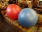 (R3) PAIR OF SUBLIME FITNESS BALLS; 1 IS IN RED AND 1 IS IN BLUE. MEASURE 21 IN DIAMETER.