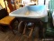 (R4) JACKSON WHEELBARROW; HAS DOUBLE WHEELS AND IS BLUE IN COLOR WITH WOODEN HANDLES. IN GOOD USED