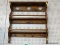 (R1) WOODEN WALL SHELF WITH SHAKER PEGS; 2 SHELF UNIT WITH FRONT RAILS, TRIPLE HEART CUT OUT ACROSS