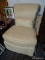 (R1) CONTEMPORARY UPHOLSTERED CHAIR; ARMLESS UPHOLSTERED ACCENT CHAIR BY DISTINCTIONS. HAS A ROLLED