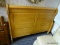 (R1) BLONDE WOOD PANELED SLEIGH BED HEADBOARD; MEASURES 64 IN X 46 IN.