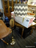 (R2) BRASS TONED FLOOR LAMP; GREY AND WHITE STRIPED BURLAP SHADE ON AN EXTENDABLE ARM ATTACHED TO A