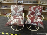 (R3) PAIR OF ROCKING PATIO CHAIRS; MADE OF ALUMINUM WITH VINYL SEATS AND BACKS. HAVE FLORAL CUSHIONS