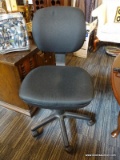 (R3) ROLLING OFFICE CHAIR; IS BLACK IN COLOR WITH BLACK BASE. MEASURES 18 IN X 16 IN X 36 IN