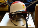 (R3) BASEBALL HELMET; WILSON BASEBALL HELMET. RED AND WHITE IN COLOR AND IN VERY GOOD CONDITION!