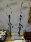 (R3) PAIR OF TABLE LAMPS; PAIR OF MODERN SWIRLING METAL TABLE LAMPS WITH MATCHING FINIALS. EACH
