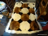 (R3) BLANKET; FAUX FUR BLANKET IN BLACK, WHITE AND BROWN. GREAT FOR CURLING UP ON THE COUCH AND