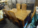 (R4) TABLE AND CHAIRS; INCLUDES 7 TOTAL PIECES. A WOOD FINISH DINING TABLE WITH STRAIGHT LEGS