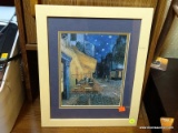 (R4) FRAMED PRINT; IS DOUBLE MATTED IN GOLD AND BLUE. DEPICTS AN OUTDOOR BISTRO SCENE LATE AT NIGHT