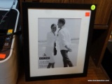 (R4) BRAND NEW PICTURE FRAME; IS BLACK IN COLOR WITH WHITE MATTING. MADE BY MALDEN. PICTURE AREA IS