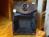 (R4) HOLMES TABLETOP HEATER; MODEL HCH4051. IS BLACK IN COLOR AND MEASURES 7 IN X 6 IN X 8 IN