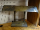 (R4) DESK LAMP; ANTIQUE DESK LAMP WITH ORIGINAL CORD. HAS A BRASS BODY WITH SUNRISE THEMED SIDES AND