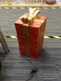 (R1) TALL RED AND GOLD GIFT BOX DECORATION; RED WITH GOLD MOLDED BOW AND STAR PATTERN ON BOX,