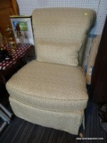 (R1) CONTEMPORARY UPHOLSTERED CHAIR; ARMLESS UPHOLSTERED ACCENT CHAIR BY DISTINCTIONS. HAS A ROLLED