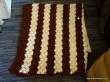(R1) BROWN AND WHITE STRIPED AFGHAN THROW; MEASURES ABOUT 56 IN X 44 IN.