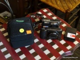 (R1) DIGITAL CAMERA LOT; INCLUDES SAMSONITE CASE, BATTERY PACK AND CORDS, AN OLYMPUS STYLUS 9000 12
