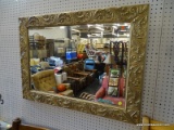 (R2) RECTANGULAR WALL MIRROR IN GOLD COLORED ACANTHUS LEAF PATTERNED FRAME; BEVELED MIRROR GLASS,