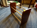 (R2) WOODEN RACK; PEG CONSTRUCTED WITH 2 ROWS, COULD BE USED FOR SHOES, HAND TOWELS, AND SO MANY