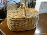 (R2) PICNIC BASKET; DOUBLE LIDS AND SINGLE HANDLE, NATURAL BROWN WICKER COLOR. MEASURES 17 IN X 12