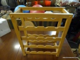 (R2) WOODEN WINE RACK; HOLDS 4 ROWS OF 4 BOTTLES EACH (16 TOTAL), PRETTY LIGHT WOOD FINISH. MEASURES