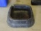 SALT BLOCK TRAY; BLACK SALT BLOCK TRAY. HAS CRACK ON ONE SIDE. MEASURES 18.5 IN X 18.5 IN X 5 IN.