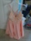 (CLO4) LIGHT PEACH COLORED SPAGHETTI STRAP FORMAL DRESS; SHORT/KNEE LENGTH WITH CRISS-CROSSING