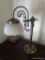 (MBR) PAIR OF BEDSIDE TABLE LAMPS; FROSTED GLASS SHADES ON SCROLLING BRASS ARMS, FLUTED POSTS AND
