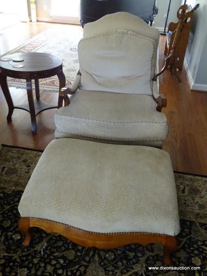 (LR) CLASSICS BY SWAIM PILLOW BACK ARMCHAIR AND OTTOMAN; WOODEN FRAME COVERED IN CREAM COLORED