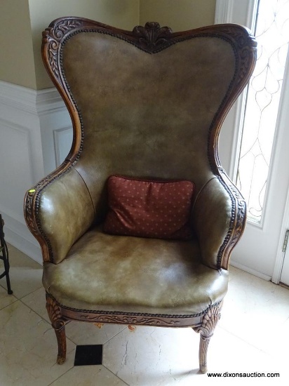 (FOY) VINTAGE LEATHER HIGH-BACK CHAIR; CARVED WOODEN FRAME WITH PLUMED CREST RAIL, CARVED AND REEDED