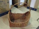 BASKET; WICKER WOVEN RECTANGULAR BASKET. MEASURES 20 IN X 15 IN X 24 IN TALL TO THE TOP OF THE