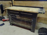 CRAFTSMAN WORKBENCH; BLACK METAL WORK TABLE WITH WOODEN TOP, TWO BLACK TRAY ATTACHMENTS ON BACK, TWO