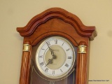 (DR) WESTMINSTER WOODEN WALL CLOCK; MOLDED BONNET SHAPED TOP WITH REEDED SIDE COLUMN DETAIL, ROUND