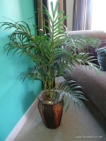 (BR4) FAUX POTTED FICUS TREE; IN PATTERNED BROWN PLANTER WITH PANELED SIDES. STANDS ABOUT 39 IN