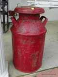 RED MILK CAN; VINTAGE DOUBLE HANDLED RED MILK CAN WITH SOME RUSTING TO THE BOTTOM AND THE TOP.