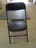 PLASTIC FOLDING CHAIR;BLACK PLASTIC AND METAL FOLDING CHAIR MADE BY PRE. MEASURES 17.5 IN X 16 IN X