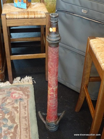 VINTAGE FIRE HOSE NOZZLE; HEAVY BRASS SPOUT AND DOUBLE HANDLES WITH RED WRAPPED HOSE IN CENTER.