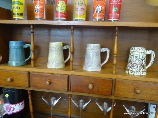 POTTERY STEINS; TOTAL OF 4. 2 ARE F.R. LEO SIGNED POTTERY BEER MUGS, AND 2 ARE HOLLAND MOLD BEER