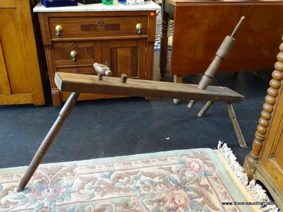 VINTAGE WOODEN SPINNING WHEEL STAND/BASE; IS IN VERY GOOD CONDITION AND MEASURES 48 IN X 19 IN X 28