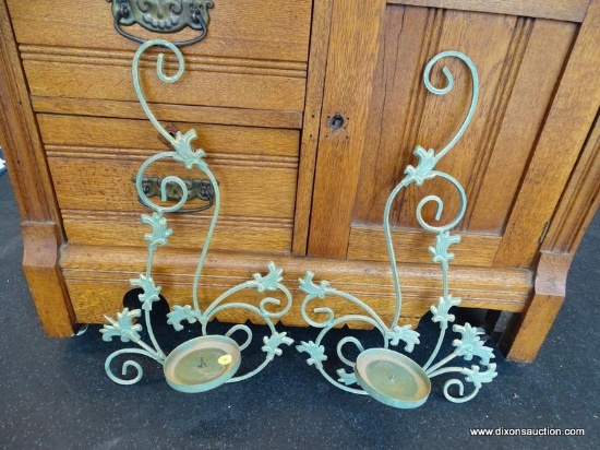 LIGHT GREEN METAL WALL SCONCES; MATCHING PAIR. HAVE A FLORAL PATTERN AND MEASURE 12 IN X 19 IN