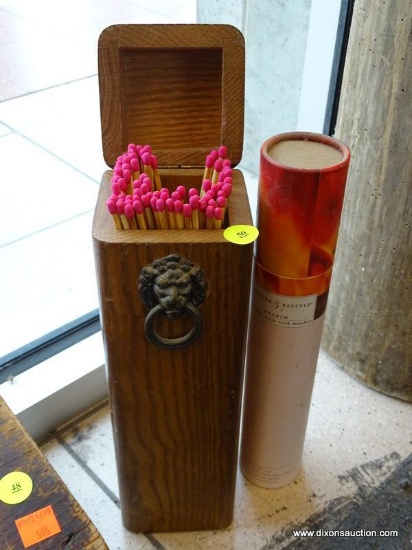FIREPLACE MATCHES AND OAK MATCH STICK HOLDER BOX; HAS A LION MOTIF AND MEASURES 13 IN TALL