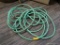 SWAN GARDEN HOSE; GREEN IN COLOR, 5/8 INCH DIAMETER, 25 FT LONG.