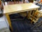 BAR TABLE; MAPLE 2 PERSON BAR TABLE WITH STRAIGHT BLOCK STYLE LEGS. MEASURES 42 IN X 19 IN X 35 IN