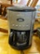 GEVALIA COFFEE MAKER; BLACK AND BRUSHED CHROME PROGRAMMABLE 12 CUP COFFEEMAKER. MODEL CM500.